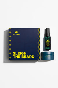 Beard care product set with a dark blue box labeled 'Sleigh the Beard' on a white background.